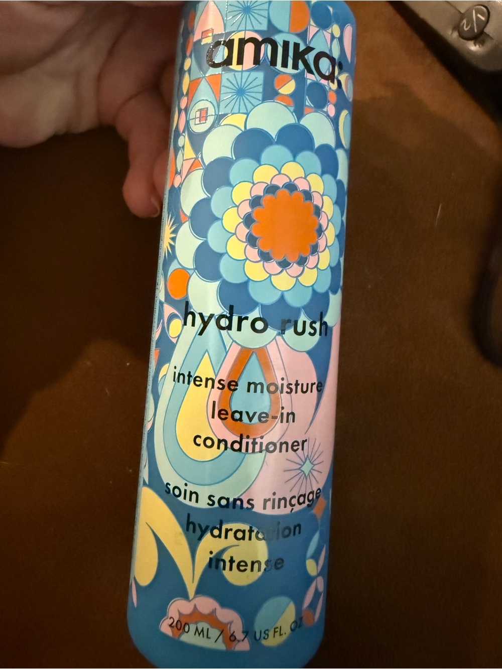 amika Hydro Rush Leave-In Conditioner - Blue with Orange & Pink Accents